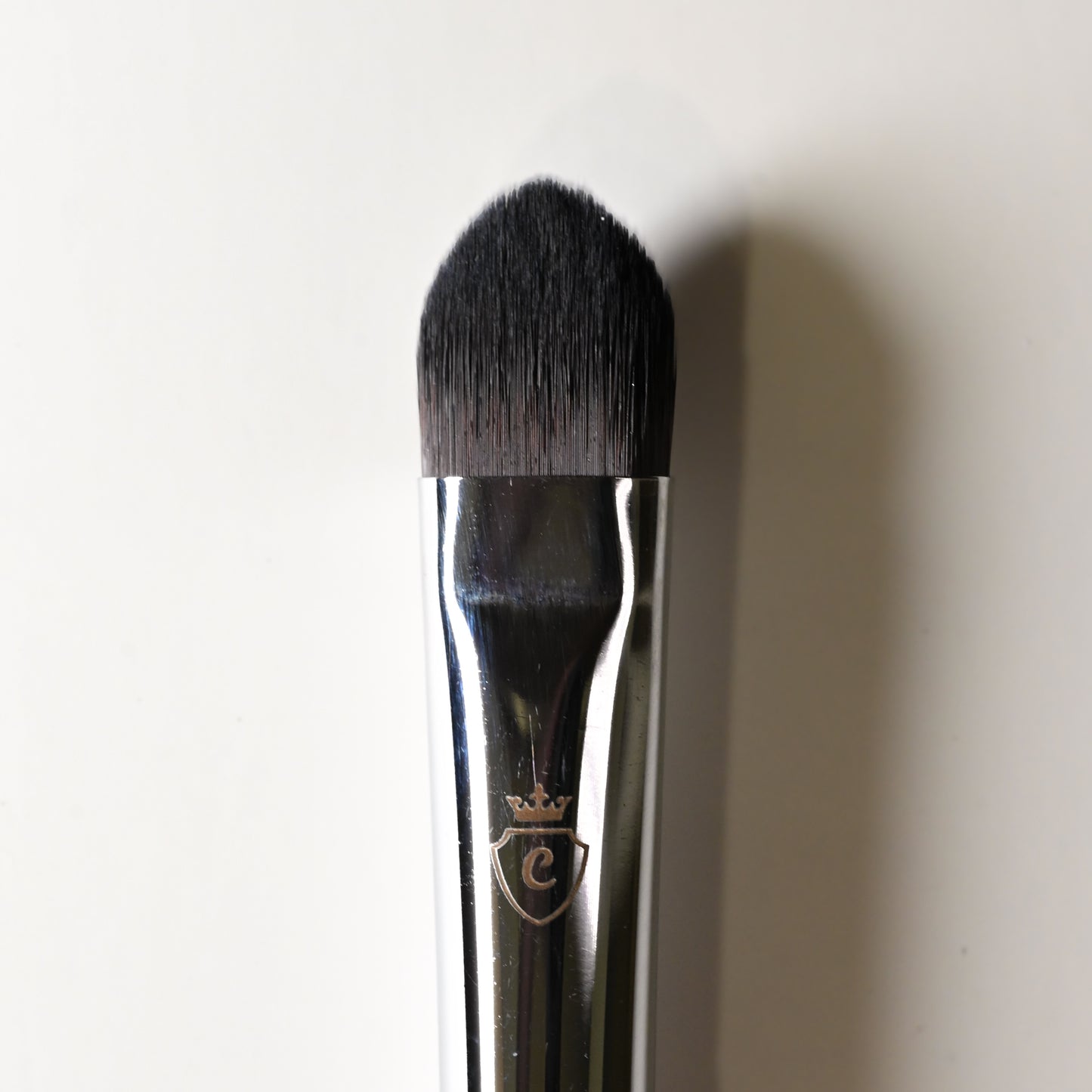 CTR W0660 small concealer brush Black Style ferrule alternate angle close-up horizontal view silver chrome Black Style handle — CTR Professional
