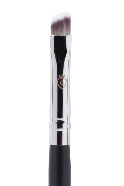 Angled makeup brush with a silver metal ferrule, black handle, and a crown logo.
