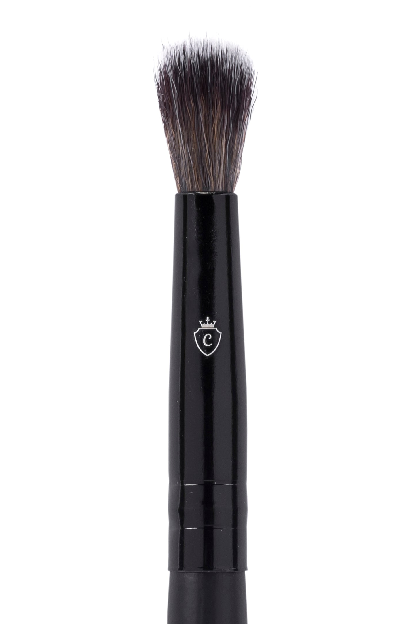 One black makeup brush with a silver C logo on the handle and soft, tapered bristles.