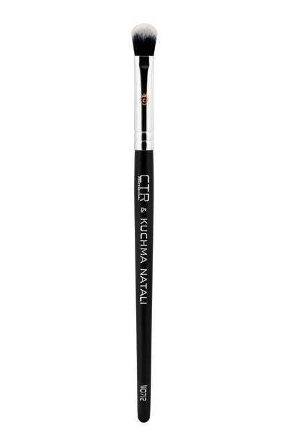 One makeup brush with a black handle, silver ferrule, and white bristles, labeled CTR & KUCHMA NATALI W0712.