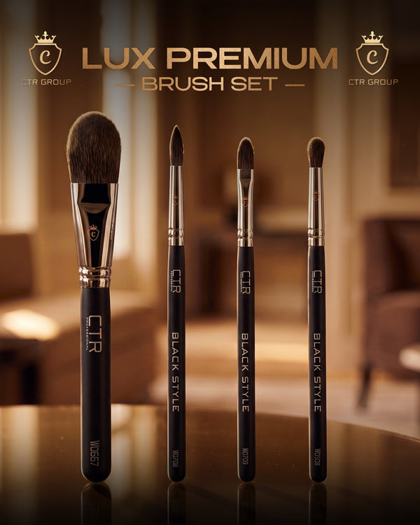 Four black makeup brushes with metal ferrules and CTR PROFESSIONAL BLACK STYLE printed on the handles.
